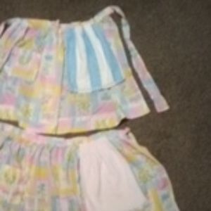 2/$12 Two vintage apron's